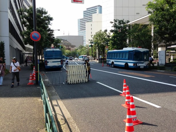There were cops everywhere and I counted at least 50 of these riot busses on the streets surrounding the shrine