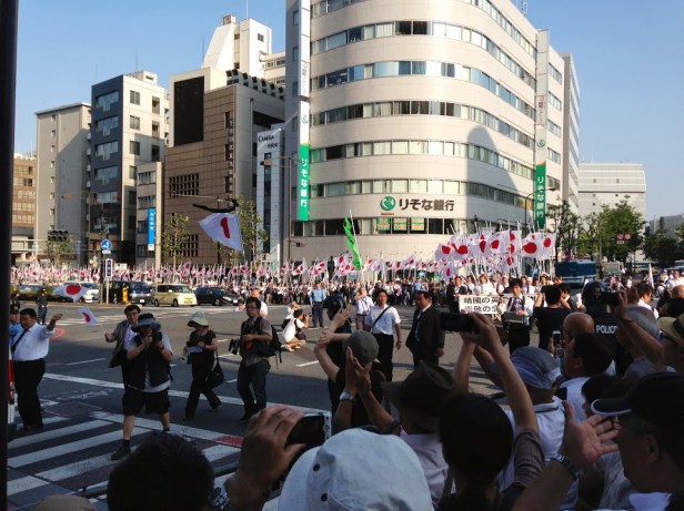 When these guys marched by the crowd with nuts with encouragement and GanBaTes.  I was really confused as I thought there was big tension between the crowds